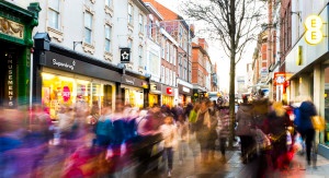 View along Clumber Street (toward Victoria Shopping Centre), Nottingham, England. 28th Dec 2013, busy post-Christmas sales. Captured with a long shutter speed to produce creative blur, and render faces blurred.